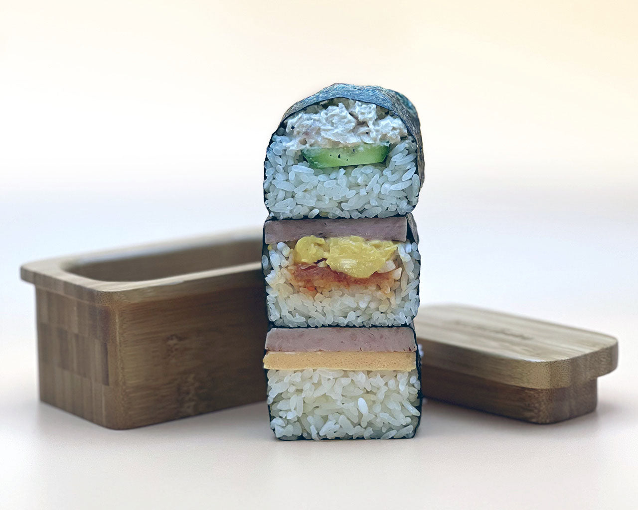 The MUSUbaby dual-sided stamp offers you ultimate culinary creativity to make traditional stacked musubi or stuffed musubi. Yes, stuffed! Use the MUSUbaby to make a cradle in your rice to fill with your favorite ingredients.